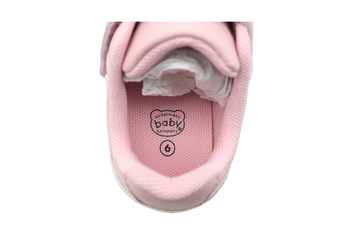 Girls' Pink Bow Strap Sneaker - inside view with pink lining and cushioned insole